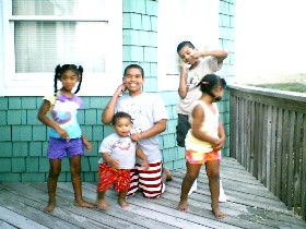 Grandkids frolic at the Outter Bank's beach house. 